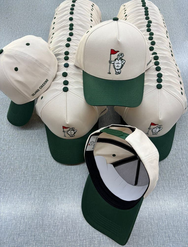 Island Greens caps with Leak the turtle embroidered on the front